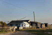 England, Kent, Romney Marsh, Dungeness, Beach houses used as homes and art galleries.