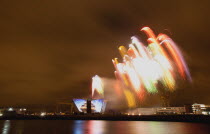 Ireland, North, Belfast, Titanic Quarter, Visitor centre designed by Civic Arts & Eric R Kuhne, illuminated during opening fireworks and projection display.