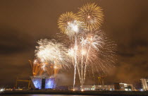 Ireland, North, Belfast, Titanic Quarter, Visitor centre designed by Civic Arts & Eric R Kuhne, illuminated during opening fireworks and projection display.