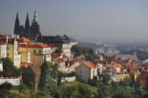 Czech Republic, Bohemia, Prague,  St Vitus Cathedral rises above the city and the River Vltava.