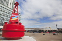 Ireland, North, Belfast, Donegall Quay, New office development on the banks of the river Lagan with red buoy in the foreground.