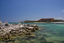 Mexico, Quintana Roo, Puerto Aventuras, View across bay and rock sculptures.