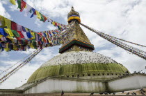 Nepal, Boudhanath Stupa near Kathmandu, with coloutful prayer flags.