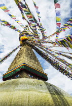 Nepal, Boudhanath Stupa near Kathmandu, with coloutful prayer flags.