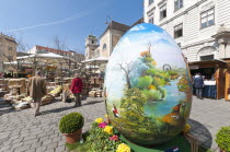 Austria, Vienna, A giant painted egg marks the entrance to the Old Vienna Easter Market at the Freyung.