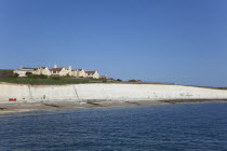 England, East Sussex, Brighton, white cliff coastline with Roedean private school for girls.