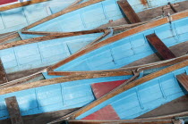 England, Oxfordshire, Oxford, Moored rowing boats on the river Cherwell near Magdalen bridge.