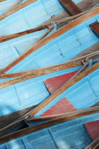 England, Oxfordshire, Oxford, Moored rowing boats on the river Cherwell near Magdalen bridge.