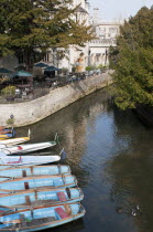 England, Oxfordshire, Oxford, Moored rowing boats on the river Cherwell near Magdalen bridge.