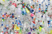 Environment, Recycling, Plastic bottles attached to a wire fence at the WOMAD festival, to highlight the need to recycle non-sustaninable materials.