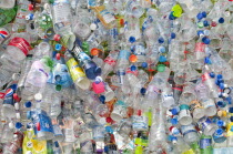 Environment, Recycling, Plastic bottles attached to a wire fence at the WOMAD festival, to highlight the need to recycle non-sustaninable materials.