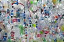 Environment, Recycling, Plastic bottles attached to a wire fence at the WOMAD festival, to highlight the need to recycle non-sustaninable materials.