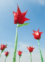 Art, Modern, Sculture, Plastic Tulips against a blue sky.