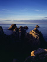 France, Bretagne, Crozon Peninsula, Pointe de Penhir. seacliffs and offshore rocks.