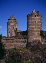 France, Bretagne, Ille-et-Vilaine, Fougeres. defensive walls and towers of the chateau dating from 11th to15th centuries.