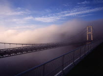 France, Bretagne, Finistere, ile de crozon. view of the old bridge to crozon over the river aulne from the new pont de terenez suspension bridge completed in 2011 in fog.