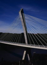 France, Bretagne, Finistere, Ile de Crozon. the new pont de terenez suspension bridge opened april 2011. from hillside above the river aulne showing suspension supports. view south.