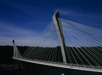 France, Bretagne, Finistere, Ile de Crozon. the new pont de terenez suspension bridge opened april 2011. from hillside above the river aulne showing suspension supports. view south.