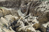 Nepal, Upper Mustang, The bridge across the deep canyon near Ghyakar village.