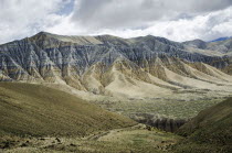 Nepal, Upper Mustang, Layered mountain structure near Lo Manthang city.