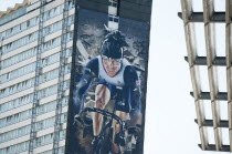 England, London, Stratford, Giant mural of UK cyclist, Sir Chris Hoy covers the side of a block of flats..