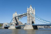 England, London, The Olympic rings suspended from the gantry of London's Tower Bridge celebrate the  2012 games. Tower bridge is a combined bascule and suspension bridge and was completed in 1894.