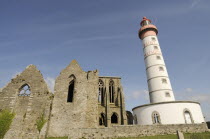 France, Brittany, St Mathieu lighthouse and ruined Abbey at Pointe de St Mathieu at the mouth of the Gulf of Brest near Le Conquet.