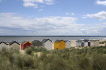 England, Suffolk, Southwold, Beach Huts on the edge of the dunes.