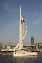 England, Hampshire, Portsmouth, Spinnaker Tower and Gunwharf Quay shopping center seen from the harbour.