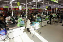 Food, Shopping, Supermarket, Busy check outs with queueing customers.