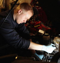Transport, Road, Repair, mechanic working on car in garage.