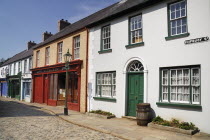 Ireland, County Tyrone, Omagh, Ulster American Folk Park, 19th century street with Victorian shopfronts.