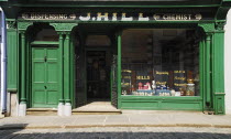 Ireland, County Tyrone, Omagh, Ulster American Folk Park, 19th century street, Hill's chemist shopfront.