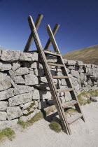 Ireland, County Down, Mourne Mountains, typical stile over Mourne wall on Slieve Donard.