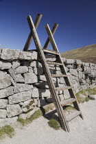 Ireland, County Down, Mourne Mountains, typical stile over Mourne wall on Slieve Donard.