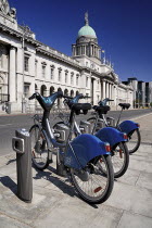 Ireland, County Dublin, Dublin City, the Custom House with some Dublinbikes for hire.