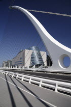 Ireland, County Dublin, Dublin City, Samuel Beckett bridge on the river Liffey with the Convention Centre.