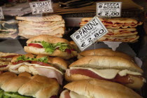 Italy, Lazio, Rome, Display of panini and pizza for sale.