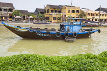 Vietnam, Quang Nam Province, Hoi An, Fishing boat moored on Thu Bon River.