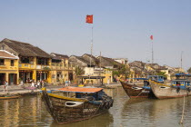 Vietnam, Quang Nam Province, Hoi An, Fishing boats moored on the Thu Bon River.