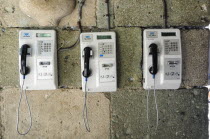 Mexico, Oaxaca, Public telephones on wall.