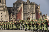 Mexico, Federal District, Mexico City, Military parade during daily Flag Lowering Ceremony in the Zocalo.