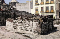 Mexico, Federal District, Mexico City, Wall of Skulls or tzompantli, in the Templo Mayor Aztec temple ruins.