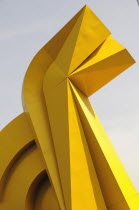 Mexico, Federal District, Mexico City, Detail of yellow Little Horse sculptural form in front of Torre Caballito on Reforma.