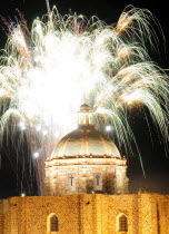 Mexico, Bajio, San Miguel de Allende, Independence Day fireworks over domed roof of the Church of San Francisco.