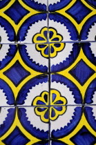 Mexico, Bajio, Queretaro, Blue, white and yellow talavera tile detail.