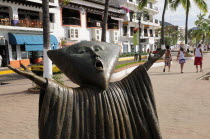Mexico, Jalisco, Puerto Vallarta, Detail of sculpture In Search of Reason by Sergio Bustamente on the Malecon.
