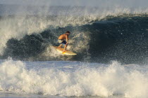 Mexico, Oaxaca, Puerto Escondido, Surfer in action.