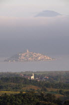 Mexico, Michoacan, Patzcuaro, Early morning misty view of Lago Patzcuaro with Isla Janitzio.