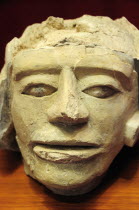 Mexico, Veracruz, Papantla, Carved, stone human head 900-1150 AD, El Tajin archaeological site museum.